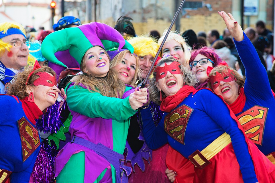 an image of people dressed during a carnival.