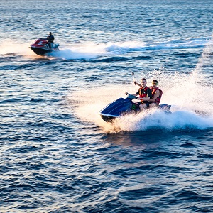 a group of people enjoying the thrill of jet ski.