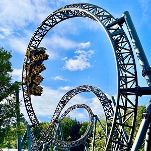 image of people enjoying on the giant roller coaster.